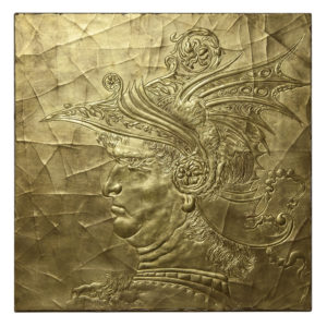A gilded relief based on a study by Leonado that has been through the cracked gesso process