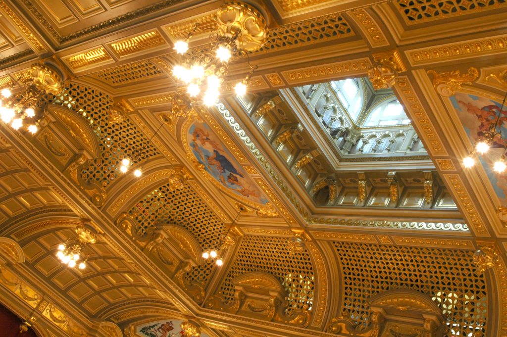 A spectacular, ornate gilded ceiling.