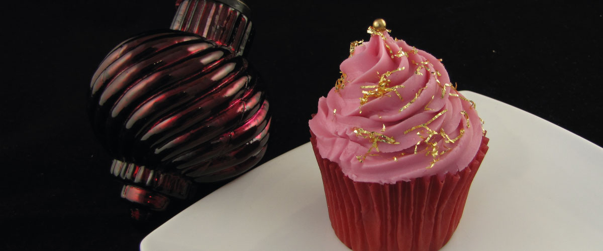 gold shavings on pink cupcake